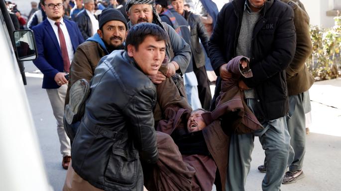Scores killed in Isis bombing of Kabul news agency and Shia centre