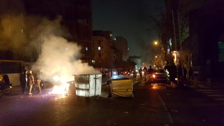 Iranian protesters attack police stations, raise stakes in unrest