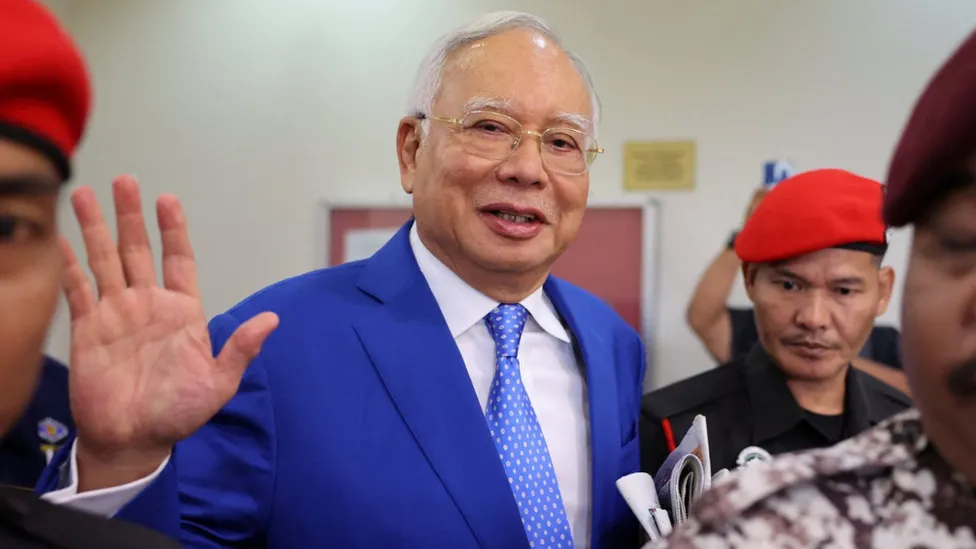 Malaysia halves ex-PM Najib Razak’s jail term over 1MDB scandal