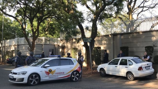 South Africa Zuma: Gupta family home raided by police